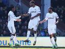 Norwich and Swansea share spoils