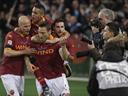 Tale of two penalties sees spoils shared in Rome derby