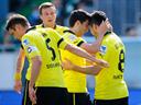 Dortmund hit six and Bayern four in easy wins