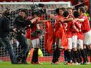 Van Persie fires Manchester United to 20th title