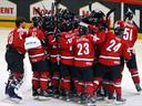 Swiss claim Canada's scalp as Russia march on