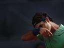 Federer crashes out of Madrid, Nadal through