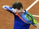 Scrappy Murray battles past Simon in Madrid