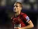 United captain Vidic expects success under Moyes