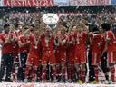 Bayern lift Bundesliga trophy after win over Augsburg