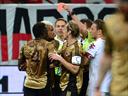 Muntari roughs up ref, racist fans stop play