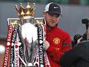 Rooney booed by United fans at trophy parade