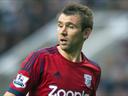 McAuley signs new Albion deal