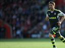 Owen bids football farewell