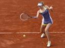 Sharapova starts defence with easy win
