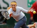 Azarenka survives lapse to ease through in Paris 