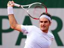 Federer crushes Devvarman to progress