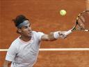Nadal and Federer through, Isner in another marathon