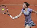 Errani battles past Radwanska