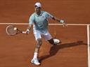 Djokovic ousts Haas to set up Nadal semi