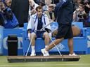 Murray comeback stalled by rain at Queen's