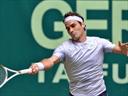 Federer battles back to clinch Halle Open title