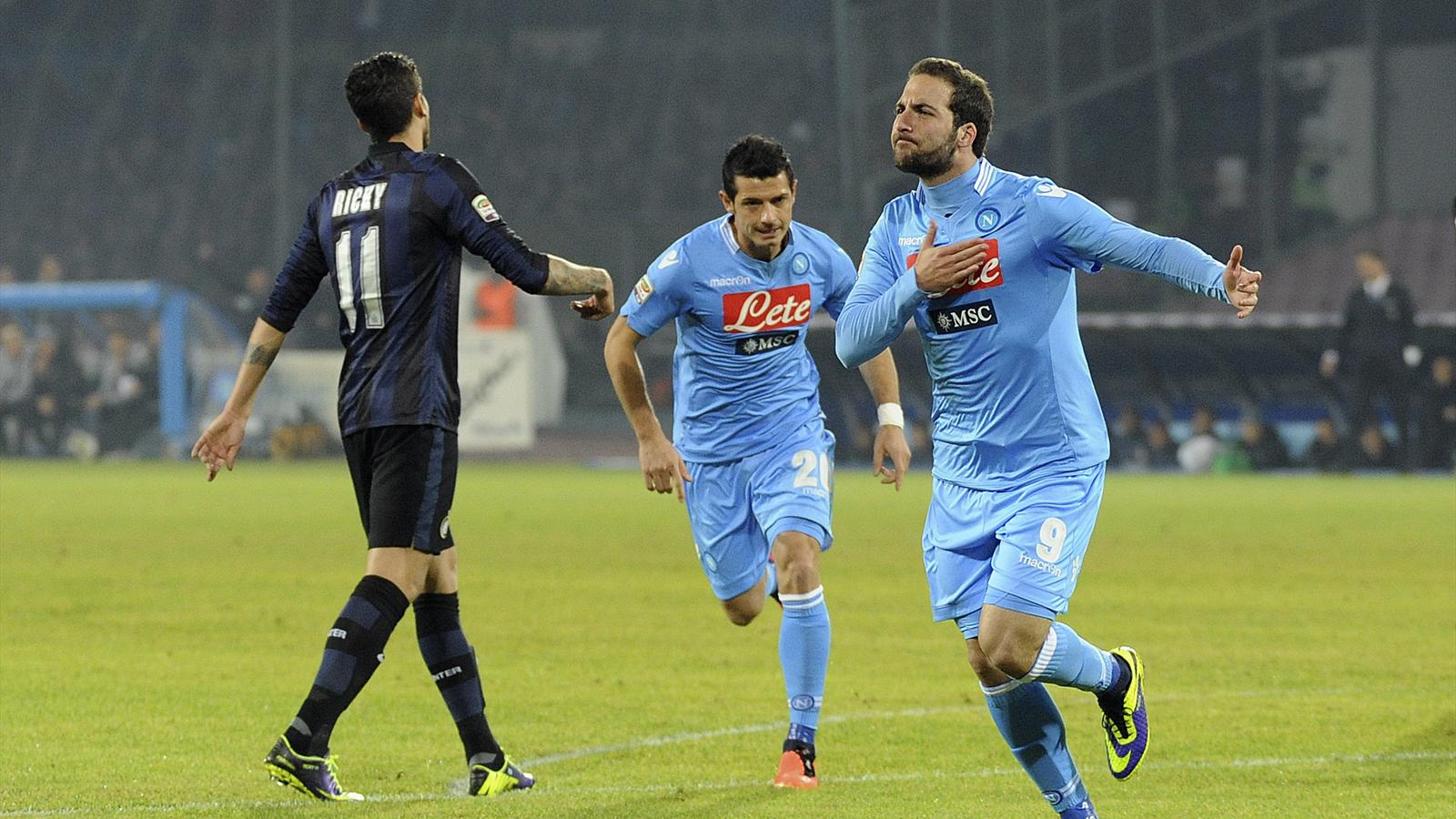 Napoli's Gonzalo Higuain (R) celebrates after scoring against Inter Milan during their Italian Serie A match at San Paolo stadium in Naples December 15, 2013 (Reuters)