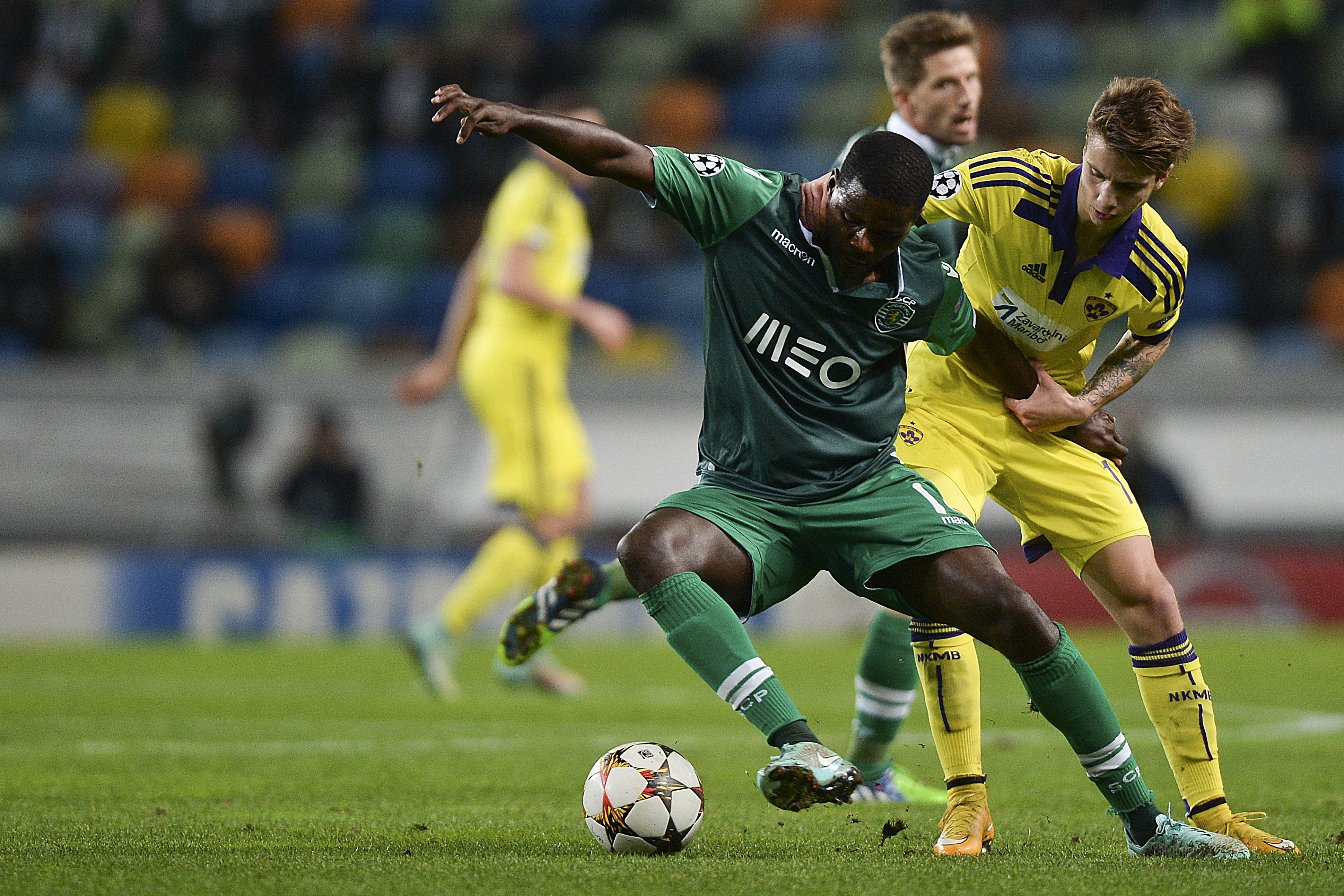 William Silva de Carvalho (Sporting), Luka Zahovic (Maribor) in Champions League in Lisbon on November 25, 2014