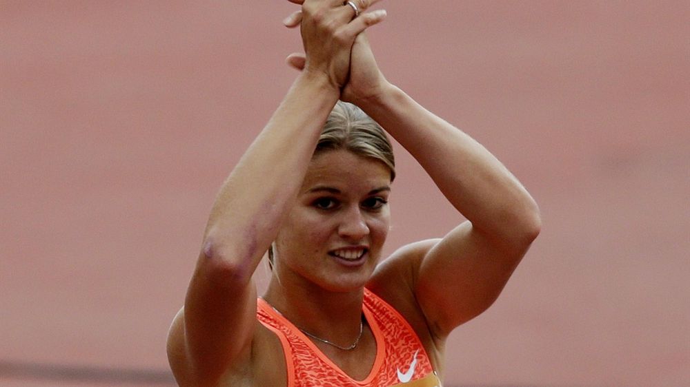 Holland's Dafne Schippers celebrates winning the women's 100m final
