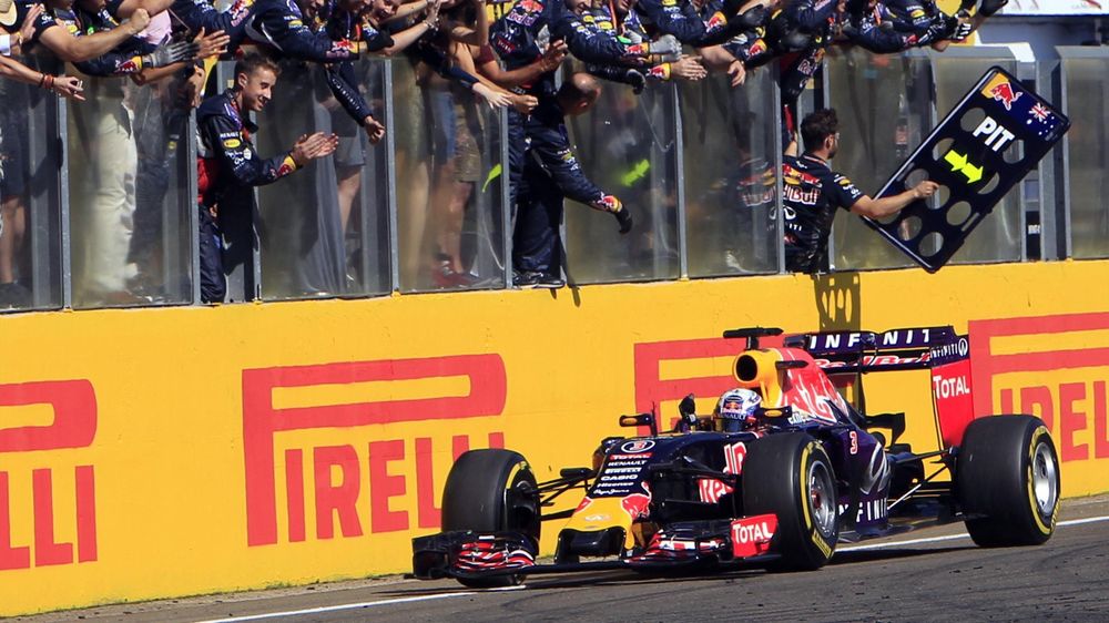 Red Bull Formula One driver Daniel Ricciardo of Australia celebrates his third place after the Hungarian F1 Grand Prix at the Hungaroring circuit, near Budapest, Hungary July 26, 2015