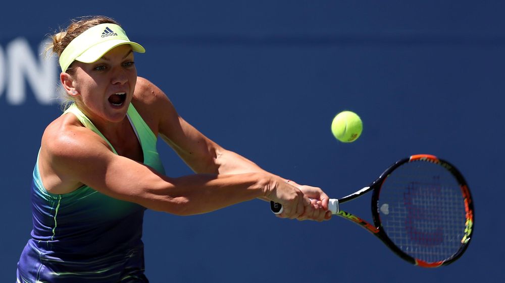 Simona Halep of Romania plays a shot at WTA Toronto, Ontario, Canada