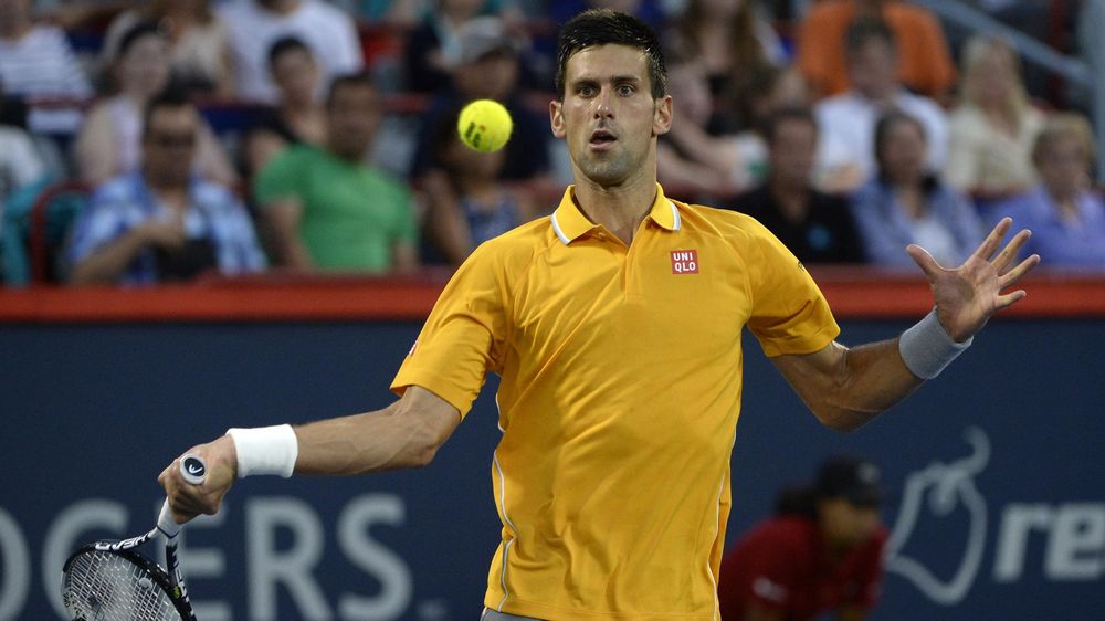 Novak Djokovic in action against Ernests Gulbis