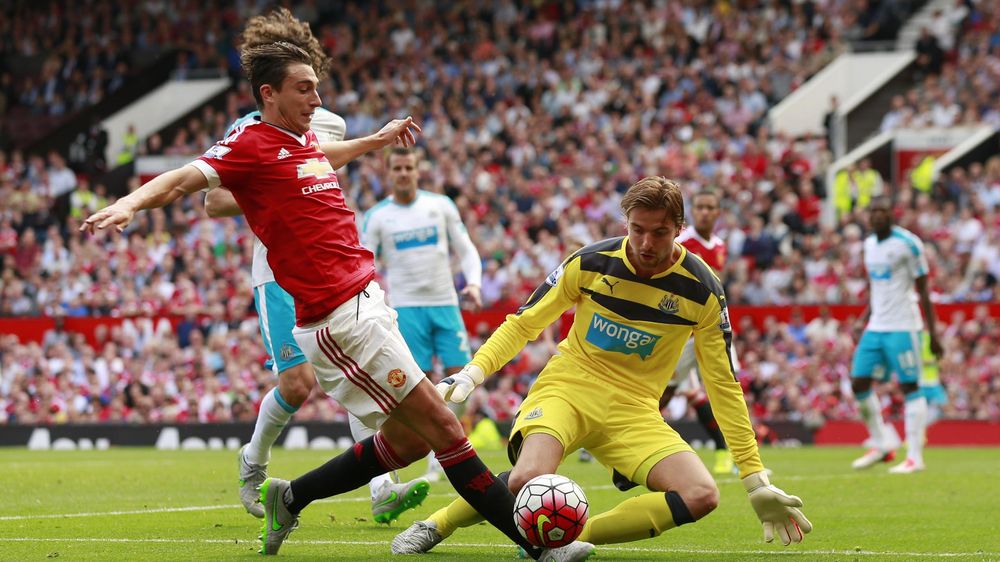 Manchester United's Matteo Darmian in action with Newcastle United's Tim Krul