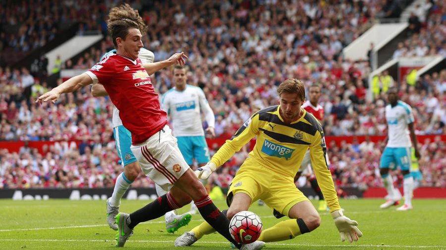 Manchester United's Matteo Darmian in action with Newcastle United's Tim Krul