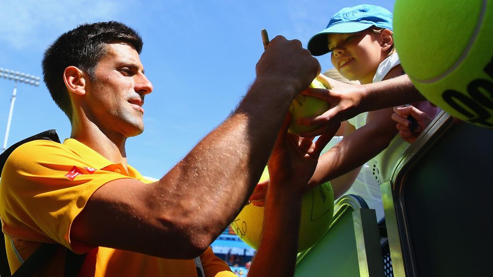 Novak Djokovic celebrates after winning through in Cincinnati