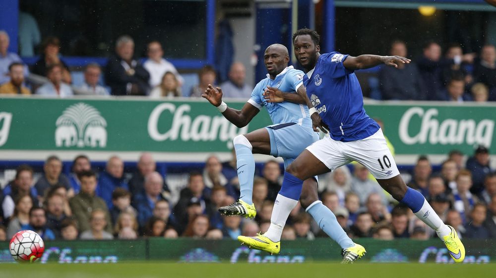 Manchester City's Eliaquim Mangala in action with Everton's Romelu Lukaku