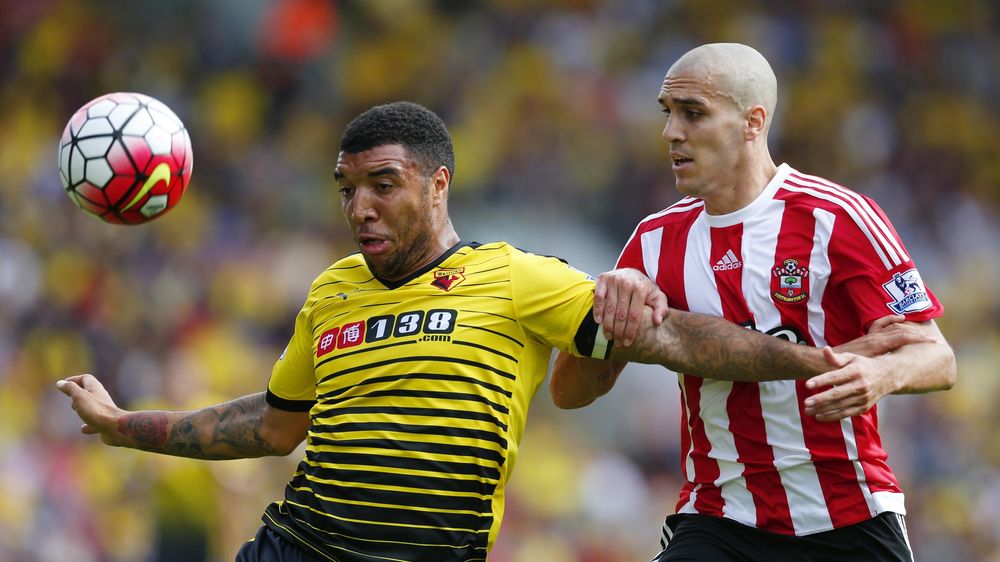 Watford's Troy Deeney battles Southampton's Oriel Romeu