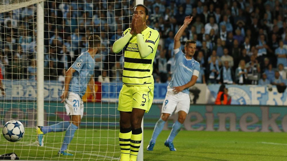 Celtic's Virgil van Dijk looks dejected after conceding at Malmo