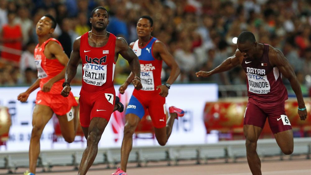 Justin Gatlin of the U.S. crosses the finish line as he wins the men's 200 metres semi-finals during the 15th IAAF World Championships at the National Stadium in Beijing, China August 26, 201