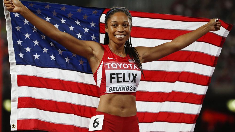 Allyson Felix from the U.S. reacts after winning the women's 400m final during the 15th IAAF World Championships at the National Stadium in Beijing, China August 27, 2015.