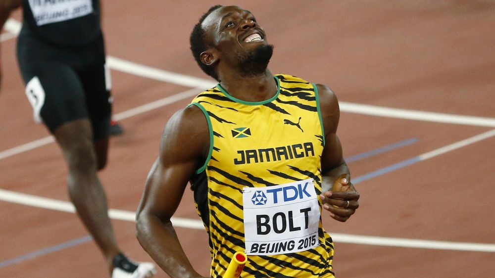 Usain Bolt of Jamaica looks up after running the anchor leg to win the men's 4 x 100 metres relay final at the 15th IAAF Championships at the National Stadium in Beijing, China August 29, 2015.