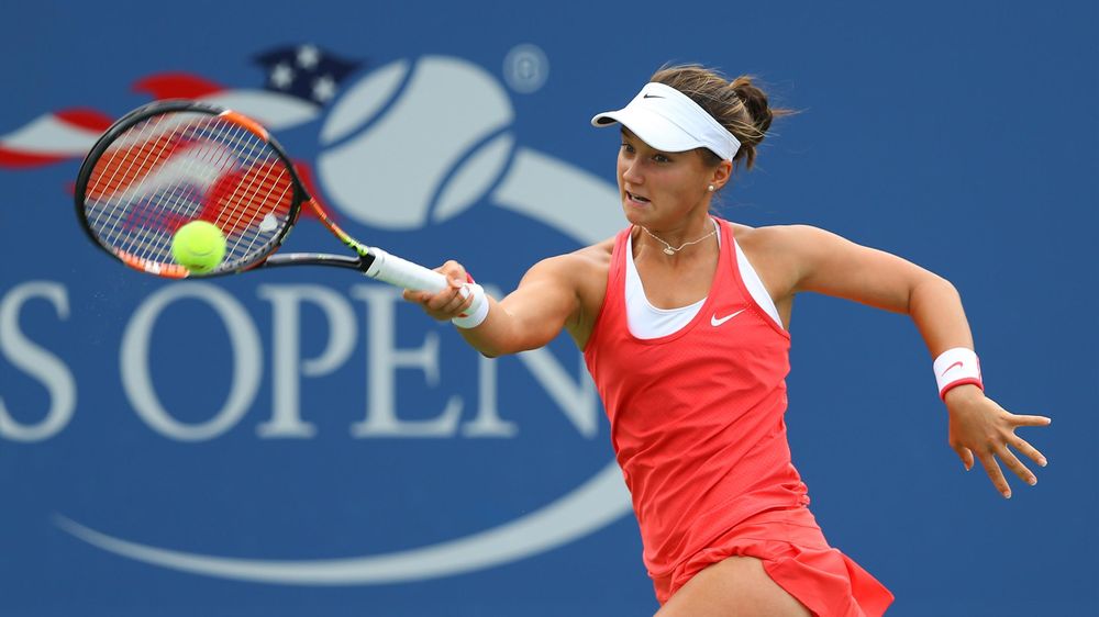 Lauren Davis of the United States returns a shot to Heather Watson of Great Britain on day one of the 2015 U.S. Open tennis tournament at USTA Billie Jean King National Tennis Center. Mandatory Credit: Jerry Lai-USA TODAY Sports