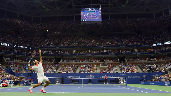 A general view of Arthur Ashe Stadium as Roger Federer serves to Steve Darcis
