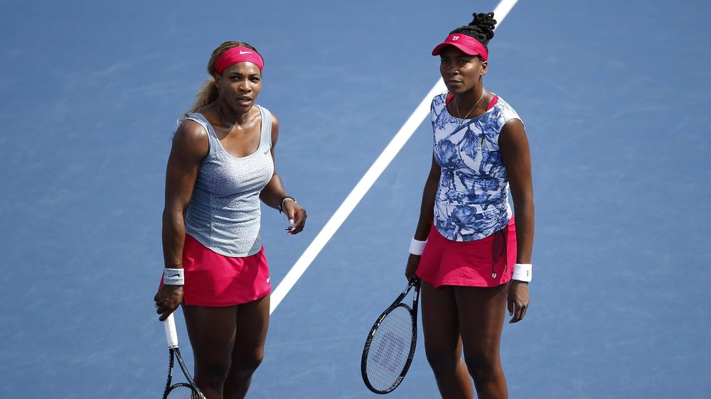 Serena and Venus Williams on the court together