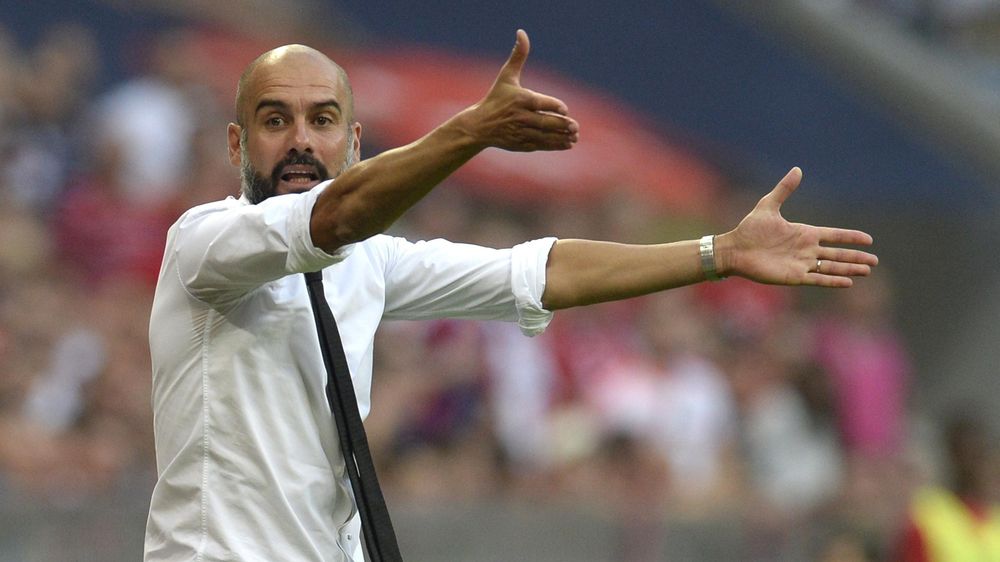 Bayern Munich's Spanish headcoach Pep Guardiola gestures during the German first division Bundesliga football match Bayern Munich vs Bayer 04 Leverkusen in