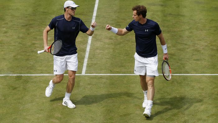 Great Britain's Jamie Murray and Andy Murray celebrate between points during their doubles match