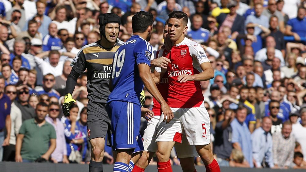 Chelsea's Diego Costa clashes with Arsenal's Gabriel Paulista