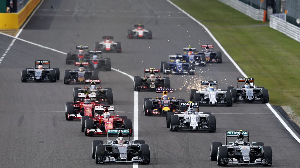 Lewis Hamilton and Nico Rosberg in action at start of Japan Grand Prix