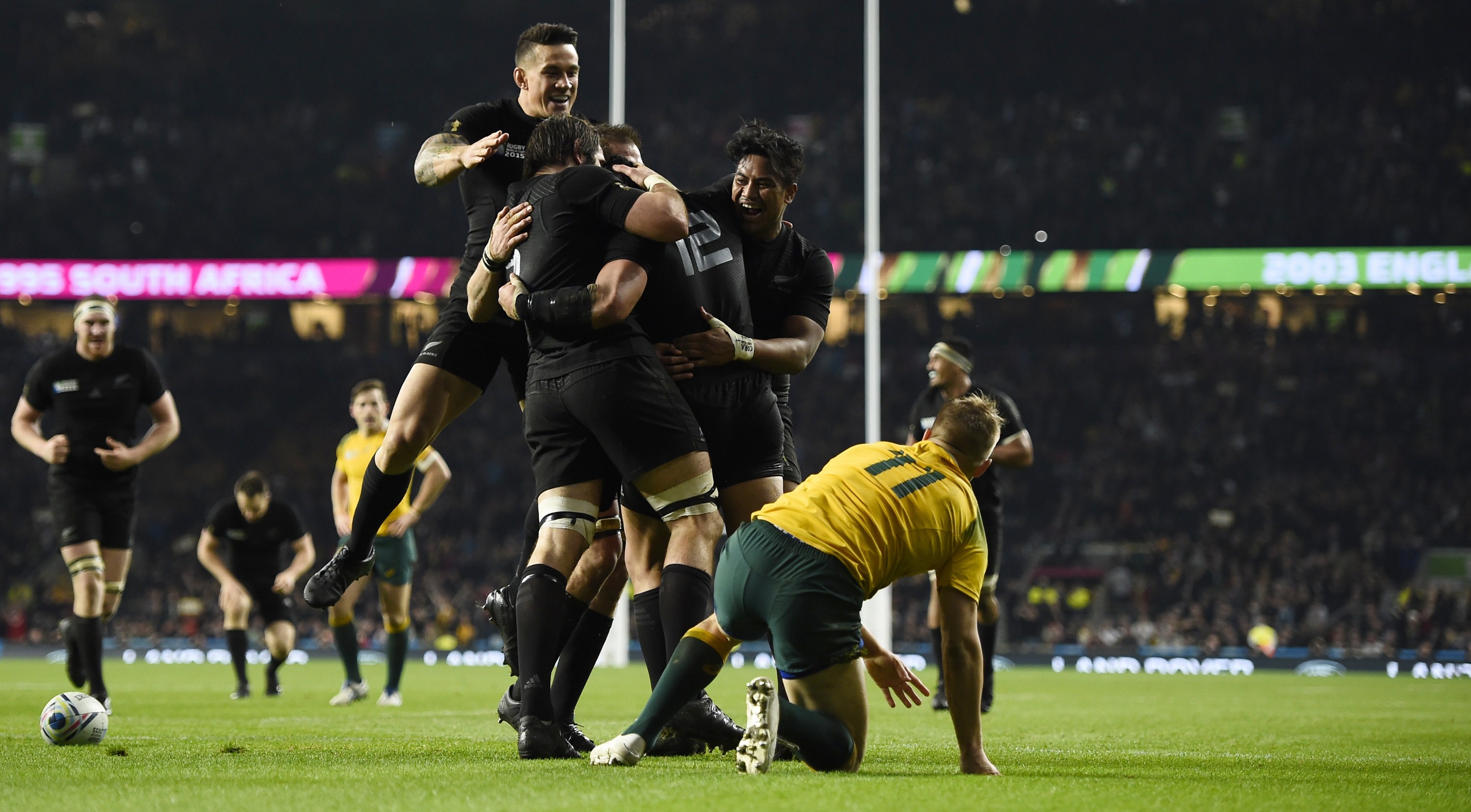 Ma'a Nonu of New Zealand celebrates with teammates after scoring a try during their Rugby World Cup final match against Australia