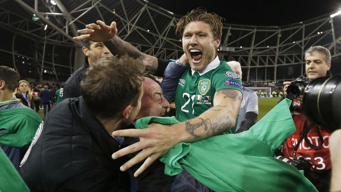 Republic of Ireland's Jeff Hendrick celebrates their UEFA Euro 2016 qualification after the match with Glenn Whelan and teammates