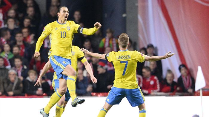 Sweden's forward and captain Zlatan Ibrahimovic (L) celebrates after scoring a goal during the Euro 2016 second leg play-off football match against Denmark at Parken stadium in Copenhagen