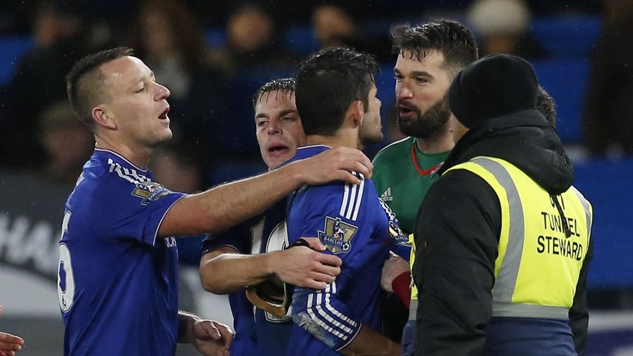 Chelsea's Brazilian-born Spanish striker Diego Costa (C) clashes with West Bromwich Albion's US-born Welsh goalkeeper Boaz Myhill after the English Premier League football match between Chelsea and West Bromwich Albion at Stamford Bridge in London on Janu