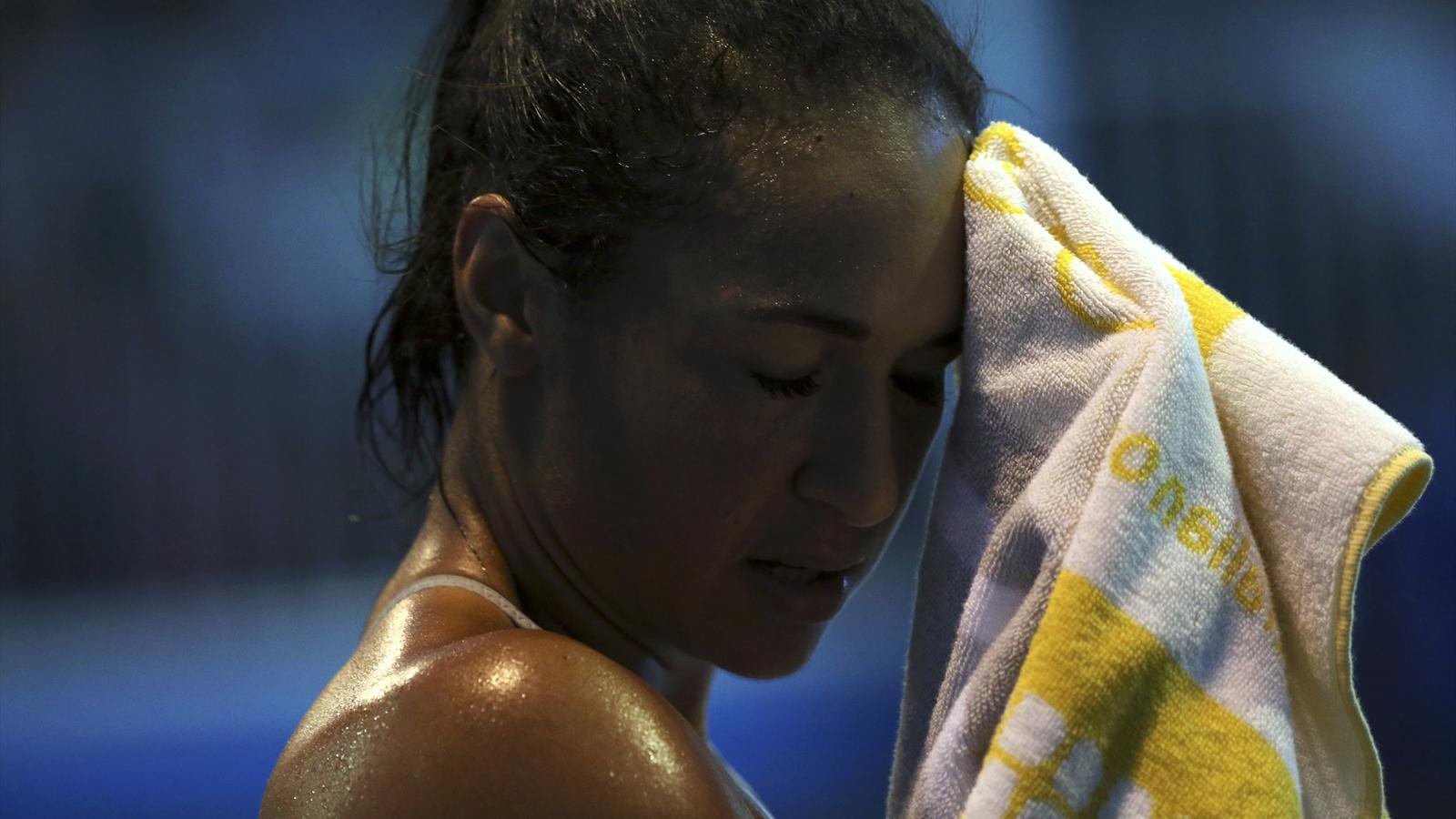 Heather Watson beaten by Caroline Wozniacki in Hong Kong