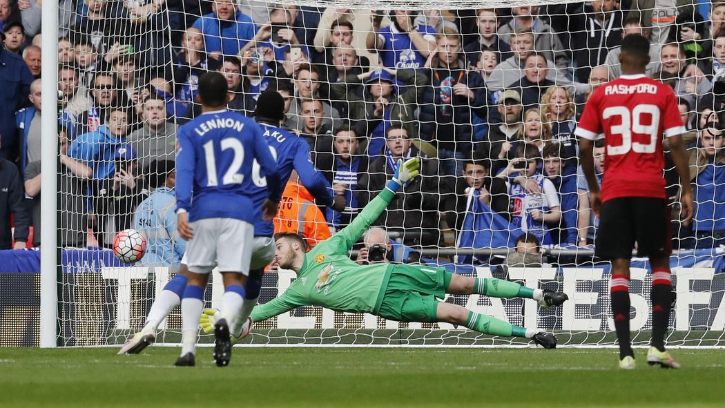 Manchester United's David De Gea saves a penalty taken by Everton's Romelu Lukaku