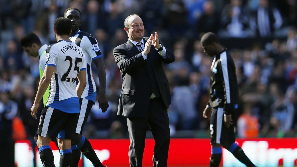 Newcastle manager Rafael Benitez applauds fans after the game